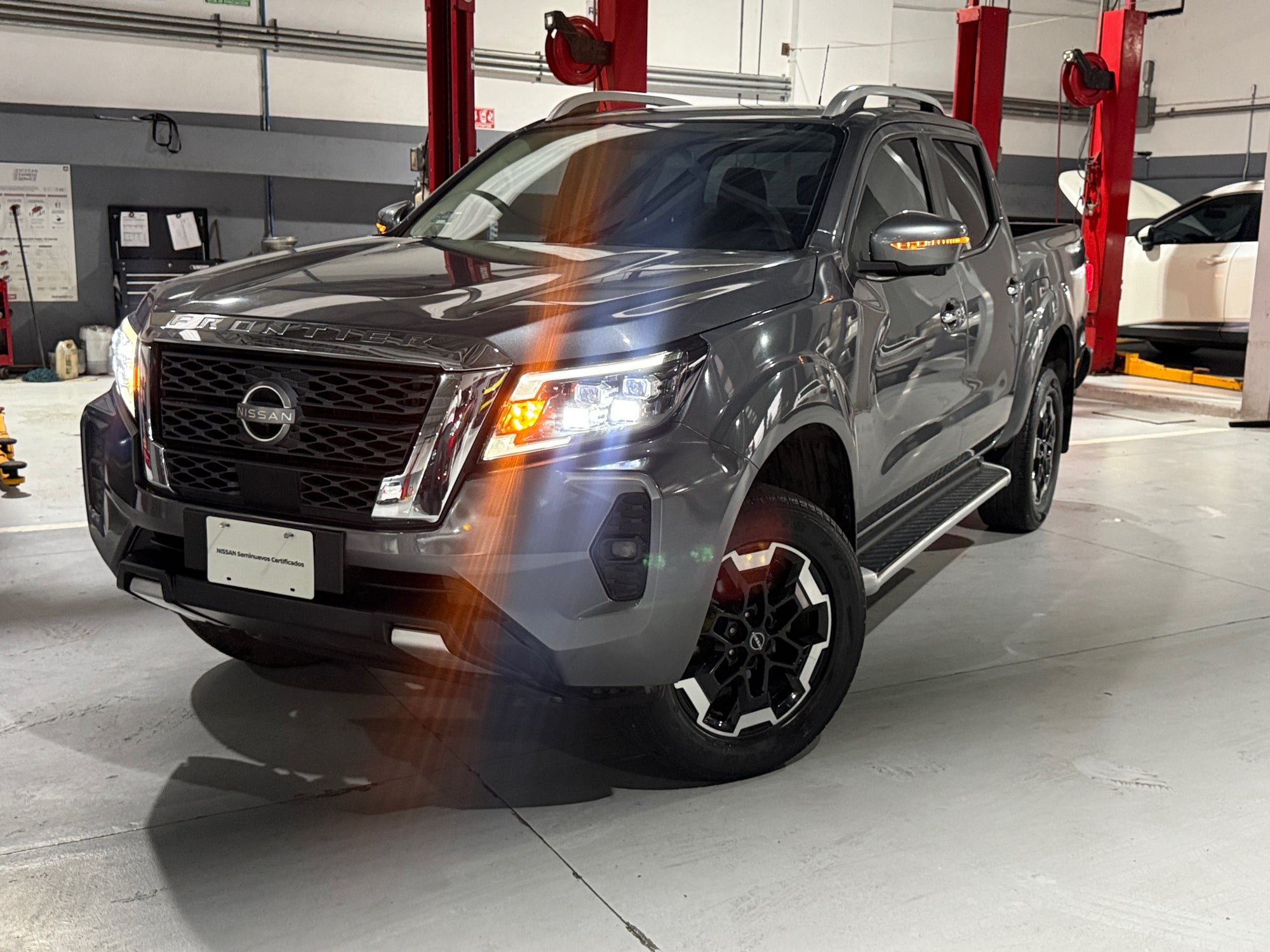 2023 Nissan FRONTIER PLATINUM LE TA 23