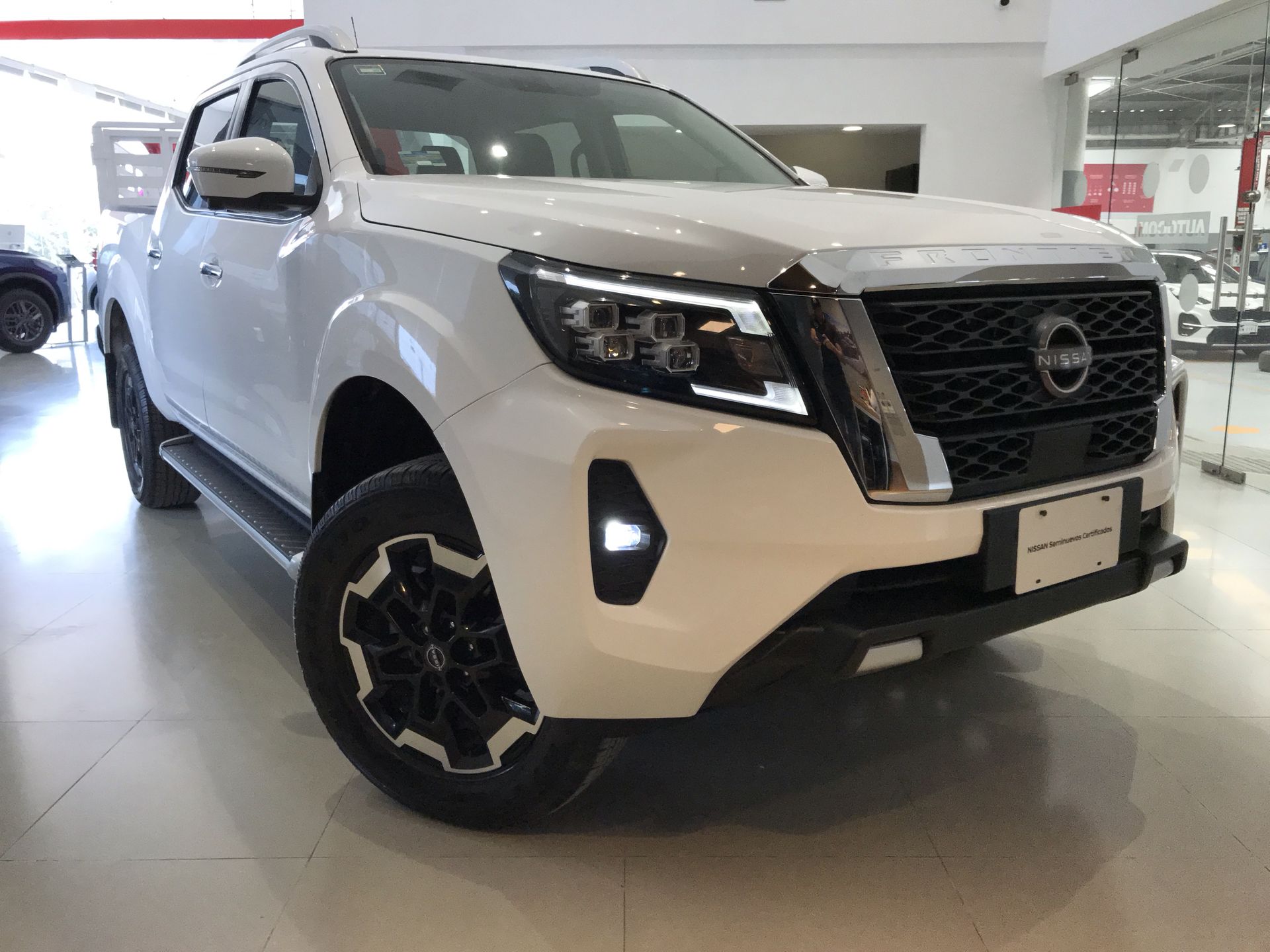 2023 Nissan FRONTIER PLATINUM LE TA 23